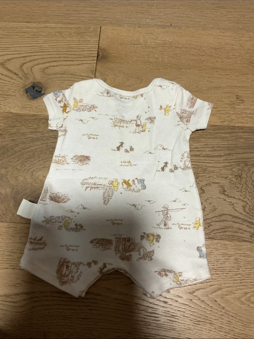 Target Cream One-Piece with Brown, Yellow, and Light Blue Character Print